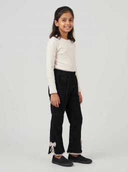 Girls Black Corduroy Flared Trousers with Lace Trim and Bow Accent